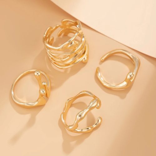 Set de 4 anillos de moda – en color dorado