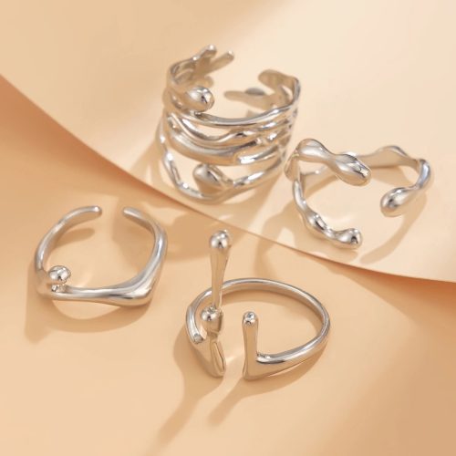 Set de 4 anillos de moda – en color plateado
